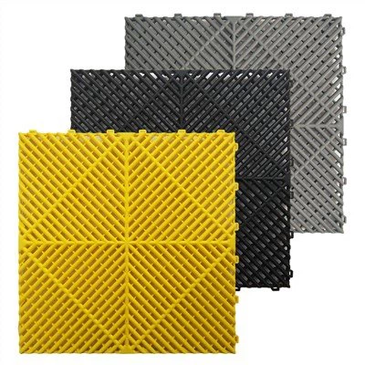 Vloertegels uit de garage afvoeren